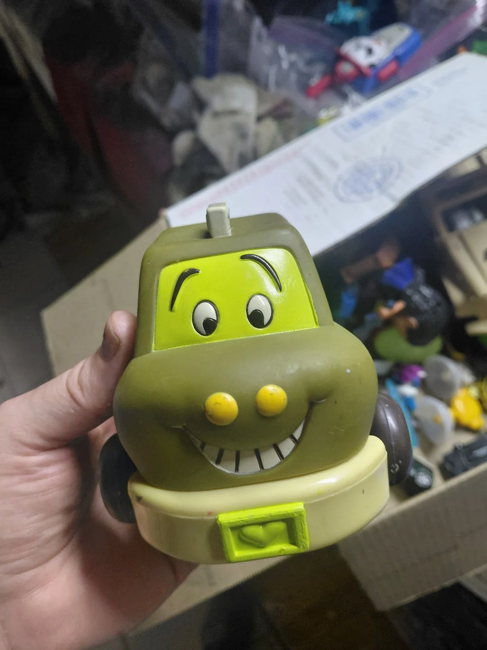 B. toys Just B You Pull-Back Taxi is a chunky olive green toy car